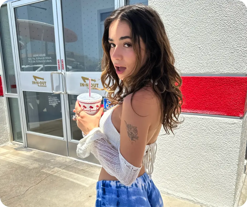 Jameliz drinking coffee on the streets
